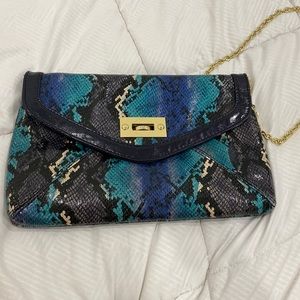 Aldo snakeskin purse different shades of blue with removable chain.